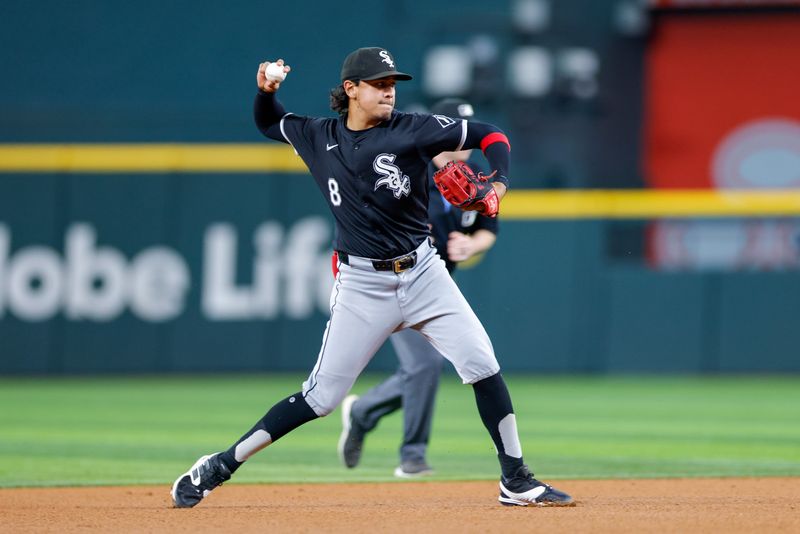 Jul 23, 2024; Arlington, Texas, USA; Chicago White Sox short stop Nicky Lopez (8) make a play on a ground ball during the sixth inning against the Texas Rangers at Globe Life Field. Mandatory Credit: Andrew Dieb-USA TODAY Sports