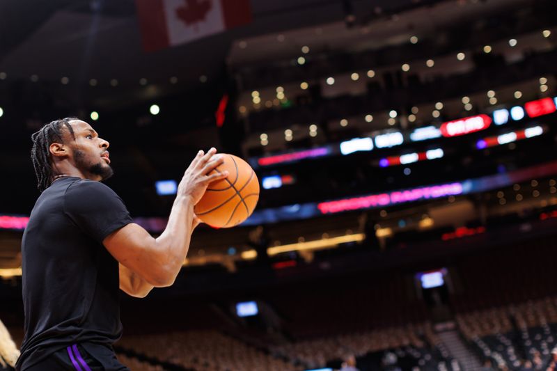 TORONTO, CANADA - NOVEMBER 1: Bronny James #9 of the Los Angeles Lakers warms up ahead of their NBA game against the Toronto Raptors at Scotiabank Arena on November 1, 2024 in Toronto, Canada. NOTE TO USER: User expressly acknowledges and agrees that, by downloading and or using this photograph, User is consenting to the terms and conditions of the Getty Images License Agreement. (Photo by Cole Burston/Getty Images)