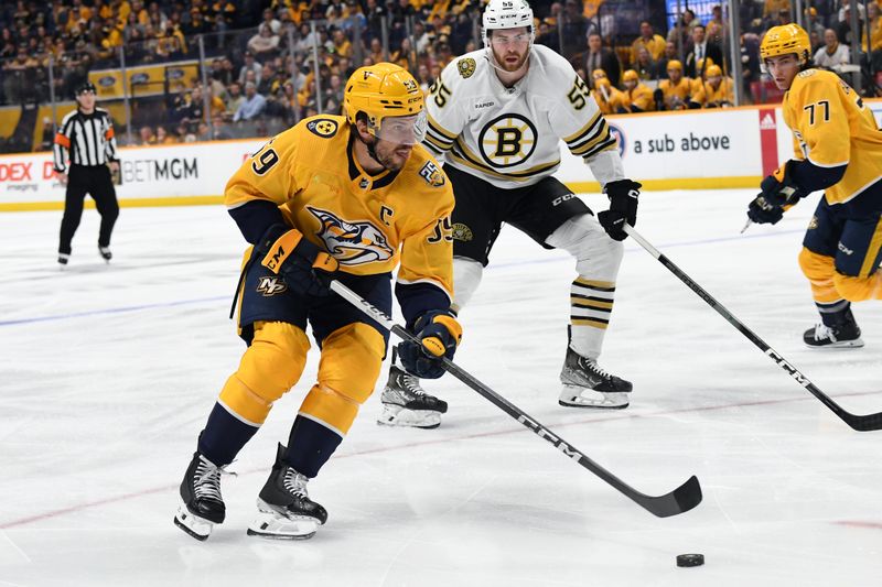 Apr 2, 2024; Nashville, Tennessee, USA; Nashville Predators defenseman Roman Josi (59) attempts a shot during the first period against the Boston Bruins at Bridgestone Arena. Mandatory Credit: Christopher Hanewinckel-USA TODAY Sports