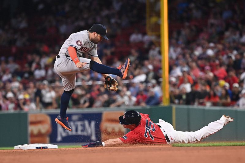 Aug 9, 2024; Boston, Massachusetts, USA; Boston Red Sox second baseman Nick Sogard (75) steals second base covered by Houston Astros second baseman Jose Altuve (27) during the fourth inning at Fenway Park. Mandatory Credit: Eric Canha-USA TODAY Sports