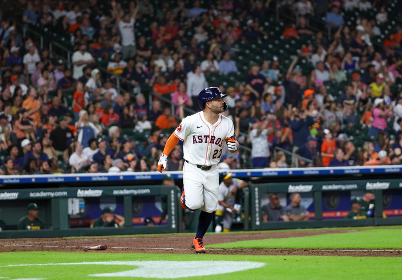 May 27, 2025; Houston, Texas, USA; Houston Astros designated hitter Jose Altuve (27) rounds the bases after hitting a home run against the Athletics in the fourth inning at Daikin Park. Mandatory Credit: Thomas Shea-Imagn Images