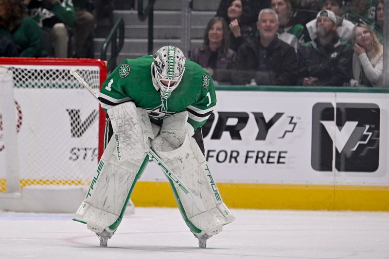 Apr 5, 2025; Dallas, Texas, USA; Dallas Stars goaltender Casey DeSmith (1) skates back to the team bench during a stoppage in play against the Pittsburgh Penguins during the second period at the American Airlines Center. Mandatory Credit: Jerome Miron-Imagn Images