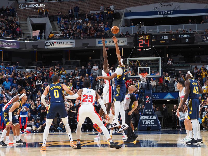 INDIANAPOLIS, IN - FEBRUARY 22:  Opening tip-off between Jalen Duren #0 of the Detroit Pistons & Myles Turner #33 of the Indiana Pacers on February 22, 2024 at Gainbridge Fieldhouse in Indianapolis, Indiana. NOTE TO USER: User expressly acknowledges and agrees that, by downloading and or using this Photograph, user is consenting to the terms and conditions of the Getty Images License Agreement. Mandatory Copyright Notice: Copyright 2024 NBAE (Photo by Ron Hoskins/NBAE via Getty Images)