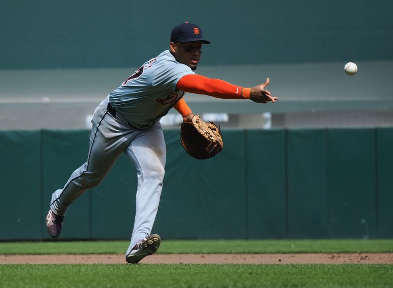 Aug 11, 2024; San Francisco, California, USA; Detroit Tigers first baseman Andy Ibanez (77) throws the ball to first base for an out against the San Francisco Giants during the seventh inning at Oracle Park. Mandatory Credit: Kelley L Cox-USA TODAY Sports