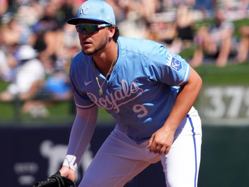 Mar 13, 2024; Surprise, Arizona, USA; Kansas City Royals first baseman Vinnie Pasquantino (9) gets in position against the Los Angeles Angels during the third inning at Surprise Stadium. Mandatory Credit: Joe Camporeale-USA TODAY Sports