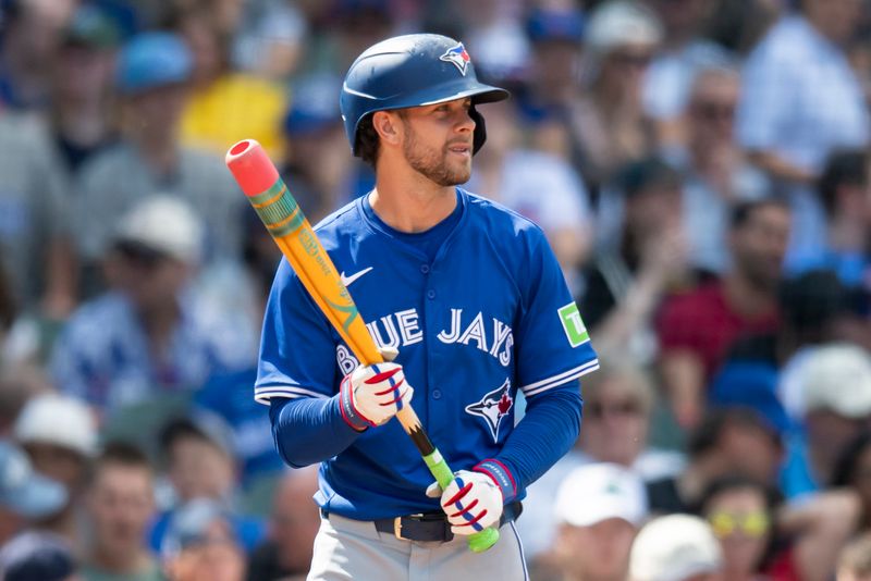 Aug 17, 2024; Chicago, Illinois, USA; Toronto Blue Jays third base Ernie Clement (28) prepares to bat during the fourth inning against the Chicago Cubs at Wrigley Field. Mandatory Credit: Patrick Gorski-USA TODAY Sports