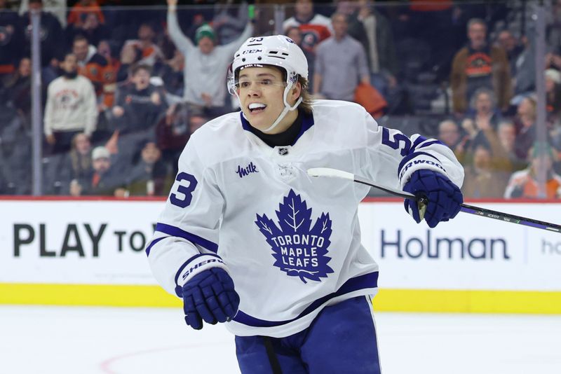 Jan 8, 2026; Philadelphia, Pennsylvania, USA; Toronto Maple Leafs right wing Easton Cowan (53) reacts after scoring the game winning goal against the Philadelphia Flyers during overtime at Xfinity Mobile Arena. Mandatory Credit: Bill Streicher-Imagn Images