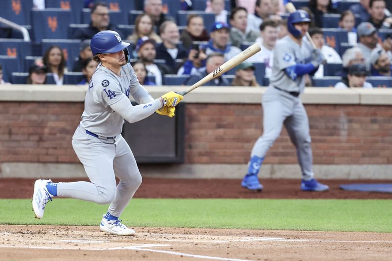 May 24, 2025; New York City, New York, USA;  Los Angeles Dodgers third baseman Enrique Hernández (8) hits an RBI single in the second inning against the New York Mets at Citi Field. Mandatory Credit: Wendell Cruz-Imagn Images