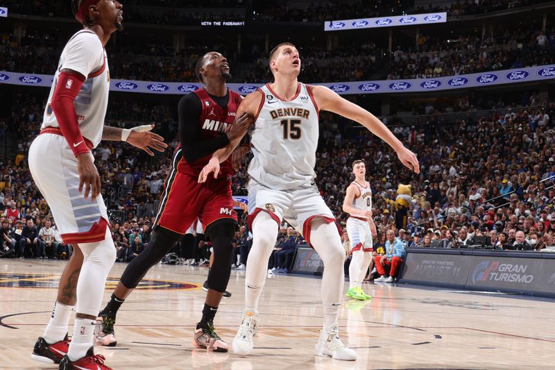 DENVER, CO - JUNE 12: Nikola Jokic #15 of the Denver Nuggets boxes out during the game against the Miami Heat during Game Five of the 2023 NBA Finals on June 12, 2023 at Ball Arena in Denver, Colorado. NOTE TO USER: User expressly acknowledges and agrees that, by downloading and or using this Photograph, user is consenting to the terms and conditions of the Getty Images License Agreement. Mandatory Copyright Notice: Copyright 2023 NBAE (Photo by Nathaniel S. Butler/NBAE via Getty Images)