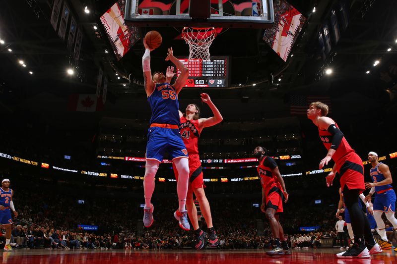 TORONTO, CANADA - MARCH 27: Isaiah Hartenstein #55 of the New York Knicks drives to the basket during the game against the Toronto Raptors on March 27, 2024 at the Scotiabank Arena in Toronto, Ontario, Canada.  NOTE TO USER: User expressly acknowledges and agrees that, by downloading and or using this Photograph, user is consenting to the terms and conditions of the Getty Images License Agreement.  Mandatory Copyright Notice: Copyright 2024 NBAE (Photo by Vaughn Ridley/NBAE via Getty Images)