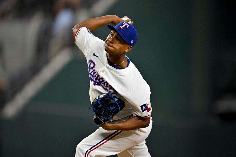 Aug 21, 2024; Arlington, Texas, USA; Texas Rangers relief pitcher Jose Leclerc (25) pitches against the Pittsburgh Pirates during the sixth inning at Globe Life Field. Mandatory Credit: Jerome Miron-USA TODAY Sports