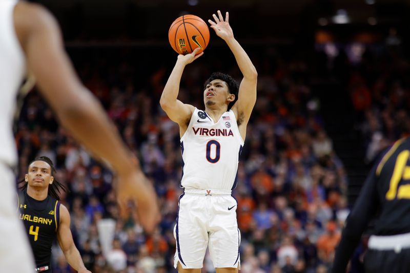 Dec 28, 2022; Charlottesville, Virginia, USA; Virginia Cavaliers guard Kihei Clark (0) shoots the ball against the Albany Great Danes in the second half at John Paul Jones Arena. Mandatory Credit: Geoff Burke-USA TODAY Sports