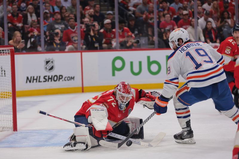 Jun 9, 2025; Sunrise, Florida, USA; Florida Panthers goaltender Sergei Bobrovsky (72) defends against Edmonton Oilers center Adam Henrique (19) during the first period in game three of the 2025 Stanley Cup Final at Amerant Bank Arena. Mandatory Credit: Sam Navarro-Imagn Images