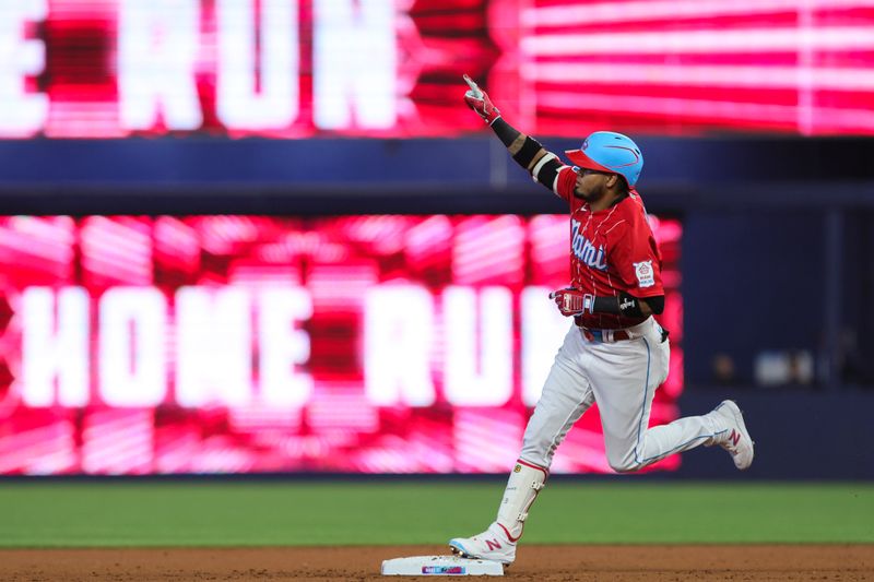 Sep 16, 2023; Miami, Florida, USA; Miami Marlins second baseman Luis Arraez (3) circles the bases after hitting a home run against the Atlanta Braves during the first inning at loanDepot Park. Mandatory Credit: Sam Navarro-USA TODAY Sports