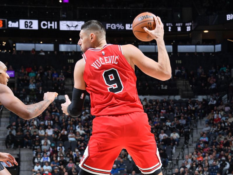 SAN ANTONIO, TX - DECEMBER 5: Nikola Vucevic #9 of the Chicago Bulls handles the ball during the game against the San Antonio Spurs on December 5, 2024 at the Frost Bank Center in San Antonio, Texas. NOTE TO USER: User expressly acknowledges and agrees that, by downloading and or using this photograph, user is consenting to the terms and conditions of the Getty Images License Agreement. Mandatory Copyright Notice: Copyright 2024 NBAE (Photos by Michael Gonzales/NBAE via Getty Images)