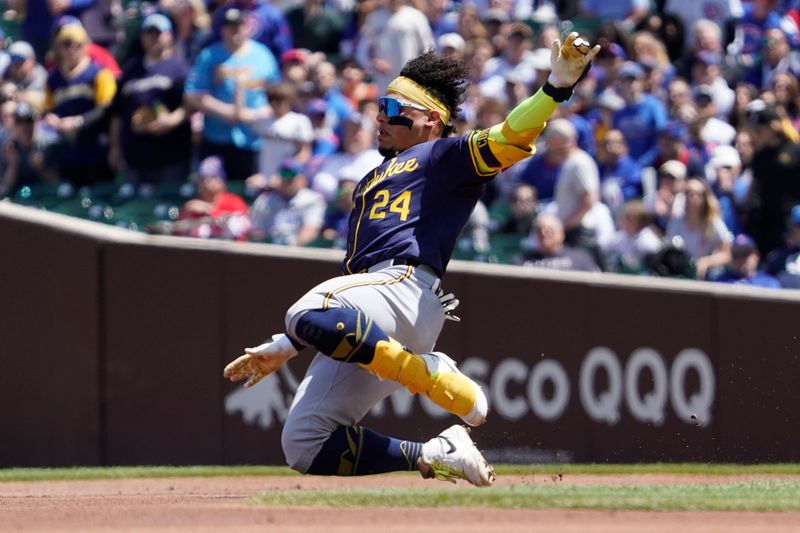 May 5, 2024; Chicago, Illinois, USA; Milwaukee Brewers catcher William Contreras (24) runs to second base with a double against the Chicago Cubs during the first inning at Wrigley Field. Mandatory Credit: David Banks-USA TODAY Sports