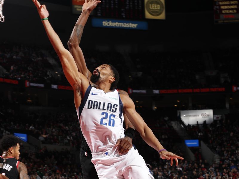 PORTLAND, OR - DECEMBER 1: Spencer Dinwiddie #26 of the Dallas Mavericks drives to the basket during the game against the Portland Trail Blazers on December 1, 2024 at the Moda Center Arena in Portland, Oregon. NOTE TO USER: User expressly acknowledges and agrees that, by downloading and or using this photograph, user is consenting to the terms and conditions of the Getty Images License Agreement. Mandatory Copyright Notice: Copyright 2024 NBAE (Photo by Cameron Browne/NBAE via Getty Images)