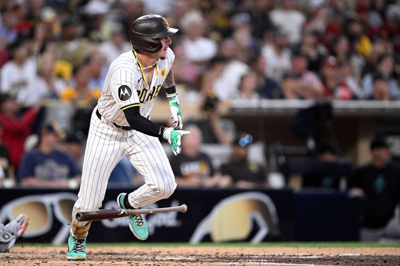 Jul 6, 2024; San Diego, California, USA; San Diego Padres center fielder Jackson Merrill (3) hits single against the Arizona Diamondbacks during the fourth inning at Petco Park. Mandatory Credit: Orlando Ramirez-USA TODAY Sports