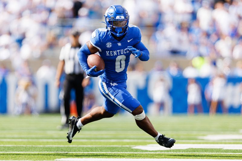 Sep 30, 2023; Lexington, Kentucky, USA; Kentucky Wildcats running back Demie Sumo-Karngbaye (0) runs the ball during the fourth quarter against the Florida Gators at Kroger Field. Mandatory Credit: Jordan Prather-USA TODAY Sports