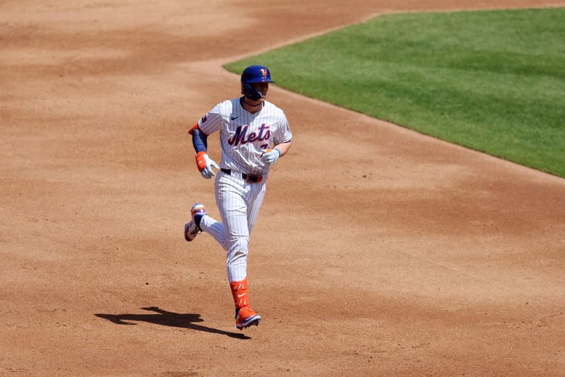 Apr 23, 2025; New York City, New York, USA; New York Mets second baseman Brett Baty (7) rounds the bases after hitting a two run home run against the Philadelphia Phillies during the second inning at Citi Field. Mandatory Credit: Brad Penner-Imagn Images
