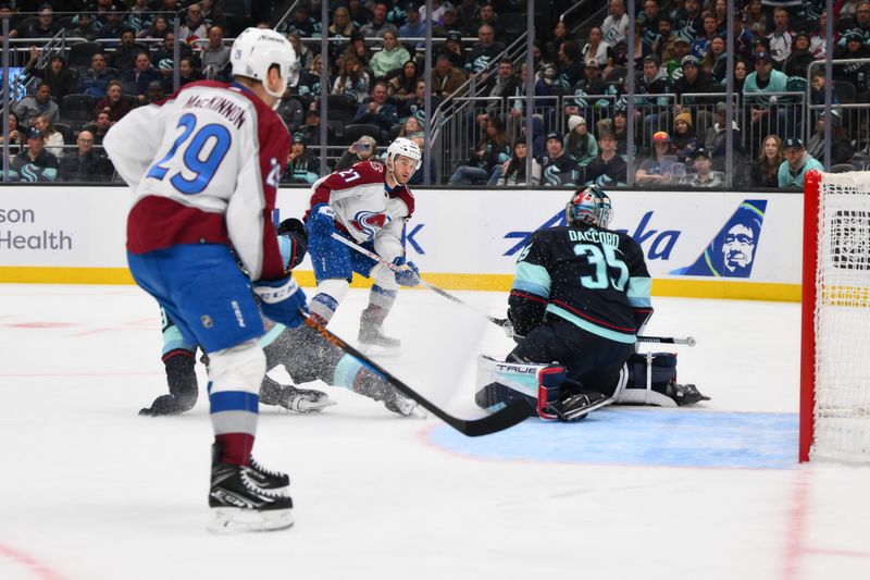 Nov 13, 2023; Seattle, Washington, USA; Colorado Avalanche left wing Jonathan Drouin (27) scores a goal against the Seattle Kraken during the third period at Climate Pledge Arena. Mandatory Credit: Steven Bisig-USA TODAY Sports