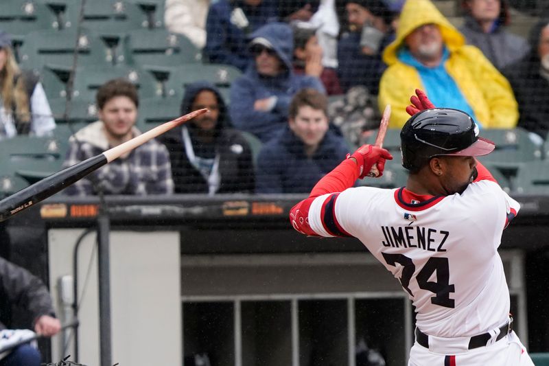 Apr 30, 2023; Chicago, Illinois, USA; Chicago White Sox designated hitter Eloy Jimenez (74) hits a broken bat single against the Tampa Bay Rays during the sixth inning at Guaranteed Rate Field. Mandatory Credit: David Banks-USA TODAY Sports