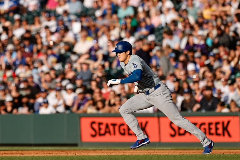 Jun 17, 2024; Denver, Colorado, USA; Los Angeles Dodgers designated hitter Shohei Ohtani (17) runs from first on an RBI in the second inning against the Colorado Rockies at Coors Field. Mandatory Credit: Isaiah J. Downing-USA TODAY Sports