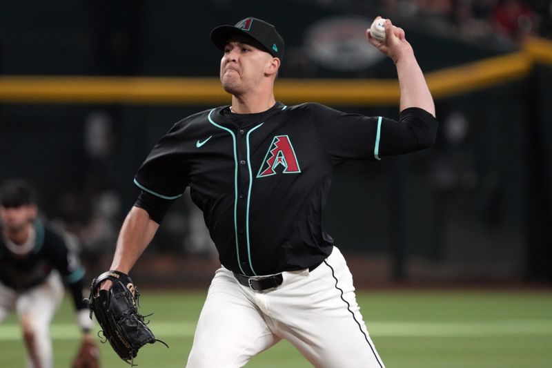 Sep 17, 2025; Phoenix, Arizona, USA; Arizona Diamondbacks pitcher Brandyn Garcia (55) throws against the San Francisco Giants in the tenth inning at Chase Field. Mandatory Credit: Rick Scuteri-Imagn Images