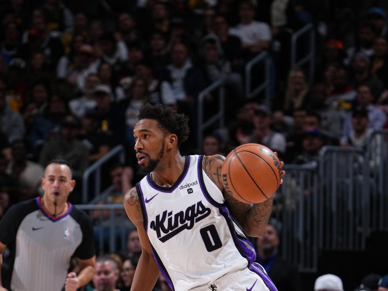 DENVER, CO - FEBRUARY 14: Malik Monk #0 of the Sacramento Kings dribbles the ball during the game against the Denver Nuggets on February 14, 2024 at the Ball Arena in Denver, Colorado. NOTE TO USER: User expressly acknowledges and agrees that, by downloading and/or using this Photograph, user is consenting to the terms and conditions of the Getty Images License Agreement. Mandatory Copyright Notice: Copyright 2024 NBAE (Photo by Garrett Ellwood/NBAE via Getty Images)