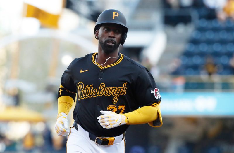 Apr 22, 2024; Pittsburgh, Pennsylvania, USA;  Pittsburgh Pirates designated hitter Andrew McCutchen (22) circles the bases after a solo home run against the Milwaukee Brewers during the first inning at PNC Park. Mandatory Credit: Charles LeClaire-USA TODAY Sports