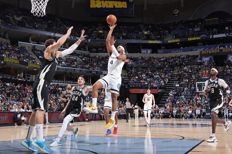 MEMPHIS, TN - FEBRUARY 15: Jordan Goodwin #4 of the Memphis Grizzlies drives to the basket during the game against the Milwaukee Bucks on February 15, 2024 at FedExForum in Memphis, Tennessee. NOTE TO USER: User expressly acknowledges and agrees that, by downloading and or using this photograph, User is consenting to the terms and conditions of the Getty Images License Agreement. Mandatory Copyright Notice: Copyright 2024 NBAE (Photo by Stephen Gosling/NBAE via Getty Images)