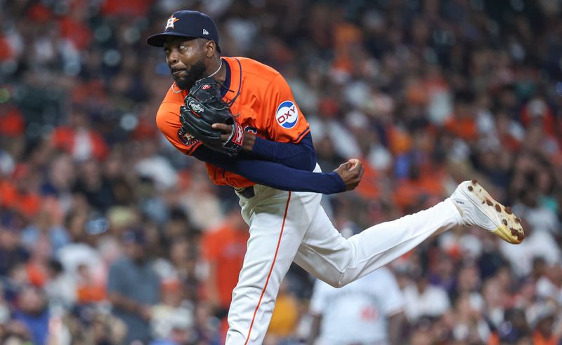 May 31, 2024; Houston, Texas, USA; Houston Astros relief pitcher Alex Speas (64) delivers a pitch during the eighth inning against the Minnesota Twins at Minute Maid Park. Mandatory Credit: Troy Taormina-USA TODAY Sports