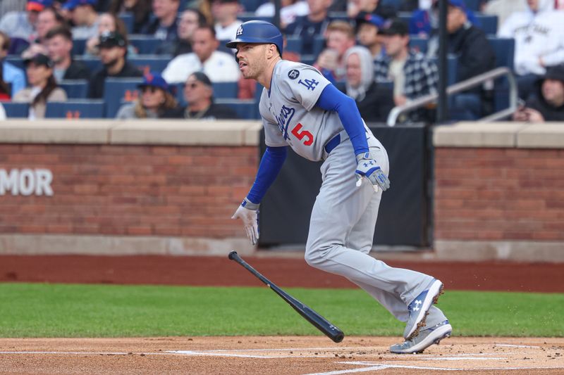 May 25, 2025; New York City, New York, USA; Los Angeles Dodgers first baseman Freddie Freeman (5) doubles  during the first inning against the New York Mets at Citi Field. Mandatory Credit: Vincent Carchietta-Imagn Images