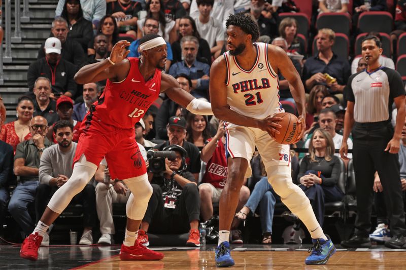 MIAMI, FL - NOVEMBER 18: Joel Embiid #21 of the Philadelphia 76ers handles the ball during the game against the Miami Heat on November 18, 2024 at Kaseya Center in Miami, Florida. NOTE TO USER: User expressly acknowledges and agrees that, by downloading and or using this Photograph, user is consenting to the terms and conditions of the Getty Images License Agreement. Mandatory Copyright Notice: Copyright 2024 NBAE (Photo by Issac Baldizon/NBAE via Getty Images)