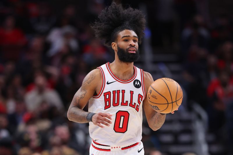 CHICAGO, ILLINOIS - FEBRUARY 28: Coby White #0 of the Chicago Bulls dribbles up the court against the Cleveland Cavaliers during the second half at the United Center on February 28, 2024 in Chicago, Illinois. NOTE TO USER: User expressly acknowledges and agrees that, by downloading and or using this photograph, User is consenting to the terms and conditions of the Getty Images License Agreement. (Photo by Michael Reaves/Getty Images)