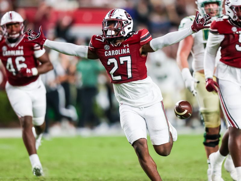 Sep 24, 2022; Columbia, South Carolina, USA; South Carolina Gamecocks defensive back DQ Smith (27) celebrates an interception against the Charlotte 49ers in the second half at Williams-Brice Stadium. Mandatory Credit: Jeff Blake-USA TODAY Sports