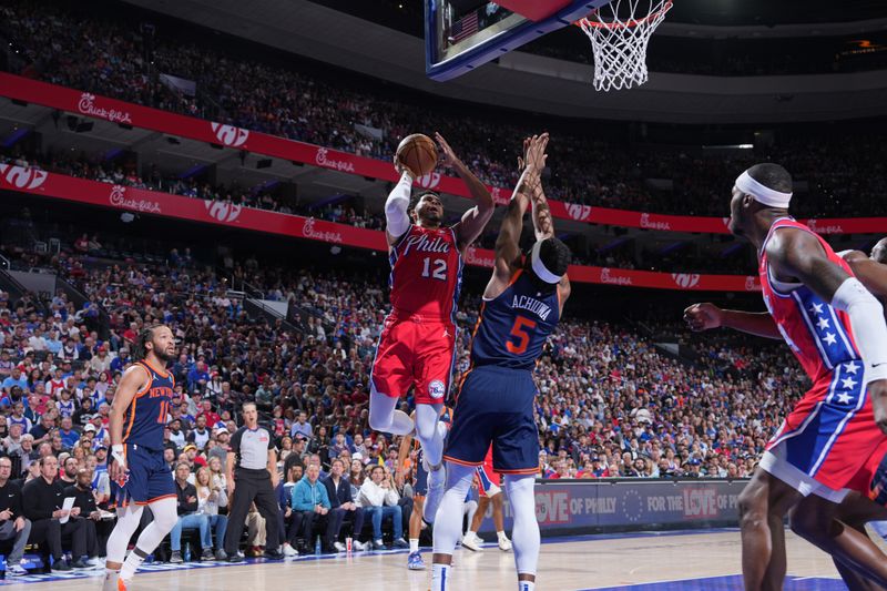 PHILADELPHIA, PA - APRIL 28: Tobias Harris #12 of the Philadelphia 76ers drives to the basket during the game against the New York Knicks during Round 1 Game 4 of the 2024 NBA Playoffs on April 28, 2024 at the Wells Fargo Center in Philadelphia, Pennsylvania NOTE TO USER: User expressly acknowledges and agrees that, by downloading and/or using this Photograph, user is consenting to the terms and conditions of the Getty Images License Agreement. Mandatory Copyright Notice: Copyright 2024 NBAE (Photo by Jesse D. Garrabrant/NBAE via Getty Images)