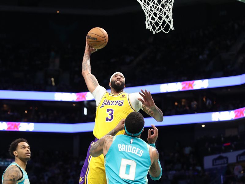 CHARLOTTE, NC - FEBRUARY 5: Anthony Davis #3 of the Los Angeles Lakers drives to the basket during the game  against the Charlotte Hornets on February 5, 2024 at Spectrum Center in Charlotte, North Carolina. NOTE TO USER: User expressly acknowledges and agrees that, by downloading and or using this photograph, User is consenting to the terms and conditions of the Getty Images License Agreement.  Mandatory Copyright Notice:  Copyright 2024 NBAE (Photo by Brock Williams-Smith/NBAE via Getty Images)