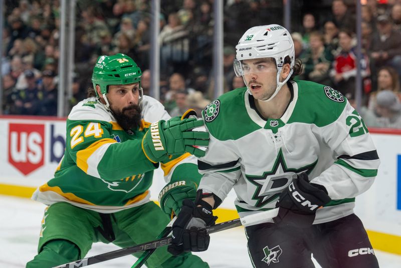 Nov 16, 2024; Saint Paul, Minnesota, USA; Minnesota Wild defenseman Zach Bogosian (24) checks Dallas Stars center Mavrik Bourque (22) in the third period at Xcel Energy Center. Mandatory Credit: Matt Blewett-Imagn Images