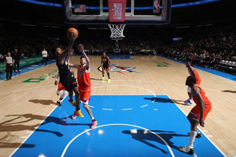 OKLAHOMA CITY, OK - MARCH 27:  Jalen Green #4 of the Houston Rockets drives to the basket during the game against the Oklahoma City Thunder on March 27, 2024 at Paycom Arena in Oklahoma City, Oklahoma. NOTE TO USER: User expressly acknowledges and agrees that, by downloading and or using this photograph, User is consenting to the terms and conditions of the Getty Images License Agreement. Mandatory Copyright Notice: Copyright 2024 NBAE (Photo by Zach Beeker/NBAE via Getty Images)