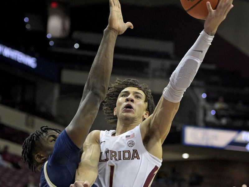 Jan 3, 2024; Tallahassee, Florida, USA; Florida State Seminoles guard Jalen Warley (1) shoots past Georgia Tech Yellow Jackets guard Miles Kelly (13) during the first half at Donald L. Tucker Center. Mandatory Credit: Melina Myers-USA TODAY Sports