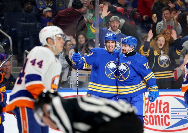 Mar 14, 2024; Buffalo, New York, USA;  Buffalo Sabres center Dylan Cozens (24) celebrates his goal with defenseman Connor Clifton (75) during the second period against the New York Islanders at KeyBank Center. Mandatory Credit: Timothy T. Ludwig-USA TODAY Sports