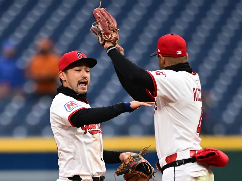 Apr 10, 2025; Cleveland, Ohio, USA; Cleveland Guardians left fielder Steven Kwan (38) and shortstop Brayan Rocchio (4) celebrate after the Guardians beat the Chicago White Sox at Progressive Field. Mandatory Credit: Ken Blaze-Imagn Images