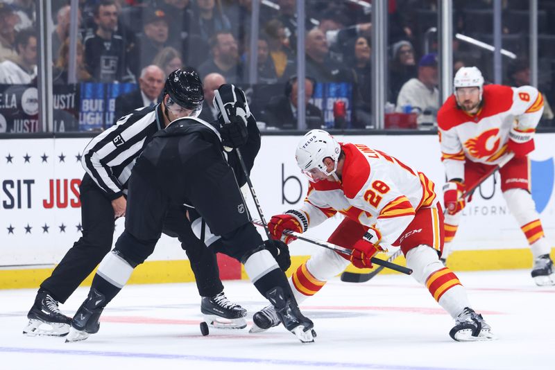 Dec 23, 2023; Los Angeles, California, USA; Calgary Flames center Elias Lindholm (28) faces off against the Los Angeles Kings during the first period of a game at Crypto.com Arena. Mandatory Credit: Jessica Alcheh-USA TODAY Sports