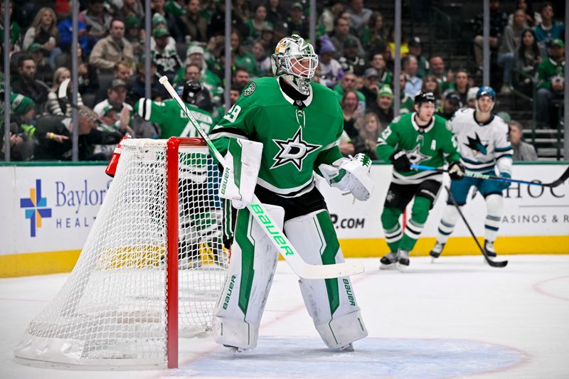 Nov 20, 2024; Dallas, Texas, USA; Dallas Stars goaltender Jake Oettinger (29) faces the San Jose Sharks attack during the first period at the American Airlines Center. Mandatory Credit: Jerome Miron-Imagn Images