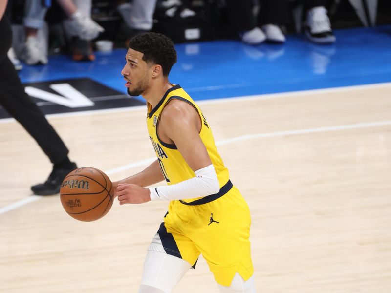 OKLAHOMA CITY, OK - JUNE 8: Tyrese Haliburton #0 of the Indiana Pacers dribbles the ball during the game against the Oklahoma City Thunder during Game 2 of the 2025 NBA Finals on June 8, 2025 at Paycom Center in Oklahoma City, Oklahoma. NOTE TO USER: User expressly acknowledges and agrees that, by downloading and or using this photograph, User is consenting to the terms and conditions of the Getty Images License Agreement. Mandatory Copyright Notice: Copyright 2025 NBAE (Photo by Joe Murphy/NBAE via Getty Images)