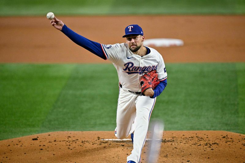 Sep 17, 2024; Arlington, Texas, USA; Texas Rangers starting pitcher Nathan Eovaldi (17) pitches against the Toronto Blue Jays during the first inning at Globe Life Field. Mandatory Credit: Jerome Miron-Imagn Images