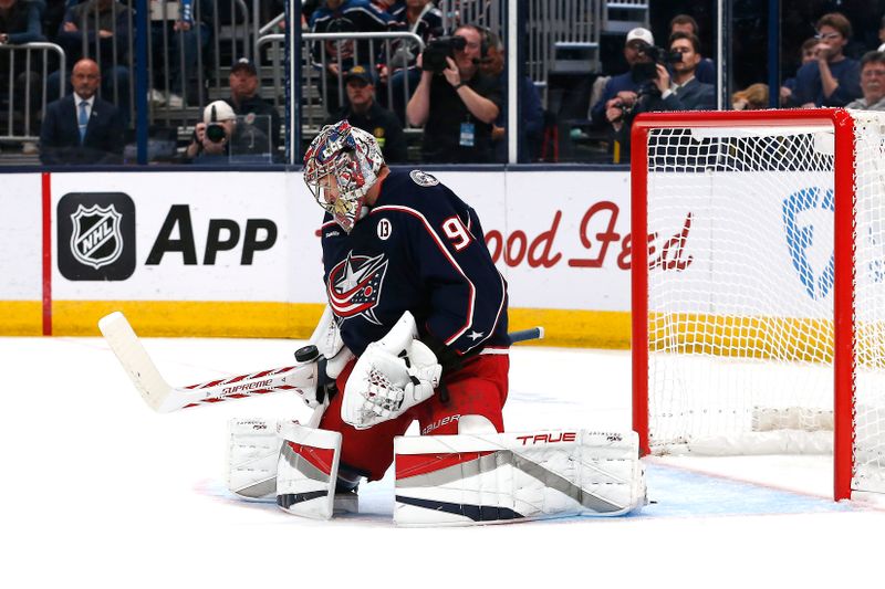 Oct 28, 2024; Columbus, Ohio, USA; Columbus Blue Jackets goalie Elvis Merzlikins (90) makes a save against the Edmonton Oilers during the first period at Nationwide Arena. Mandatory Credit: Russell LaBounty-Imagn Images