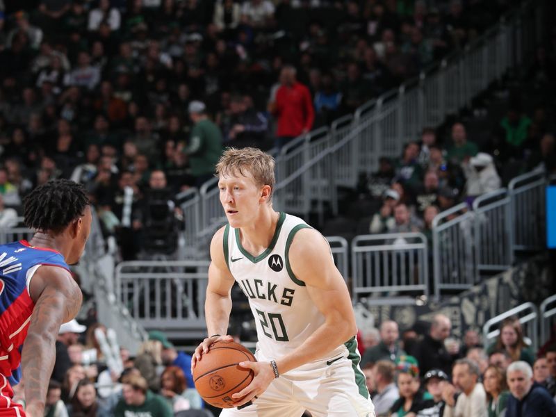 MILWAUKEE, WI - NOVEMBER 13: AJ Green #20 of the Milwaukee Bucks dribbles the ball during the game against the Detroit Pistons on November 13, 2024 at the Fiserv Forum Center in Milwaukee, Wisconsin. NOTE TO USER: User expressly acknowledges and agrees that, by downloading and or using this Photograph, user is consenting to the terms and conditions of the Getty Images License Agreement. Mandatory Copyright Notice: Copyright 2024 NBAE (Photo by Gary Dineen/NBAE via Getty Images).