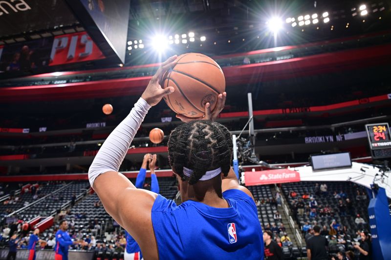 DETROIT, MI - MARCH 7: Stanley Umude #17 of the Detroit Pistons warms up before the game against the Brooklyn Nets on March 7, 2024 at Little Caesars Arena in Detroit, Michigan. NOTE TO USER: User expressly acknowledges and agrees that, by downloading and/or using this photograph, User is consenting to the terms and conditions of the Getty Images License Agreement. Mandatory Copyright Notice: Copyright 2024 NBAE (Photo by Chris Schwegler/NBAE via Getty Images)